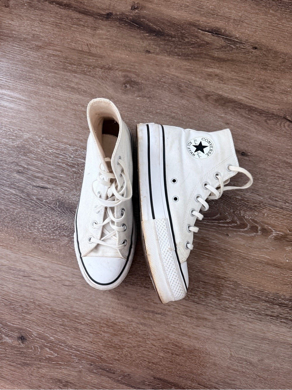 Converse High Top Sneakers in Cream and Black Trim